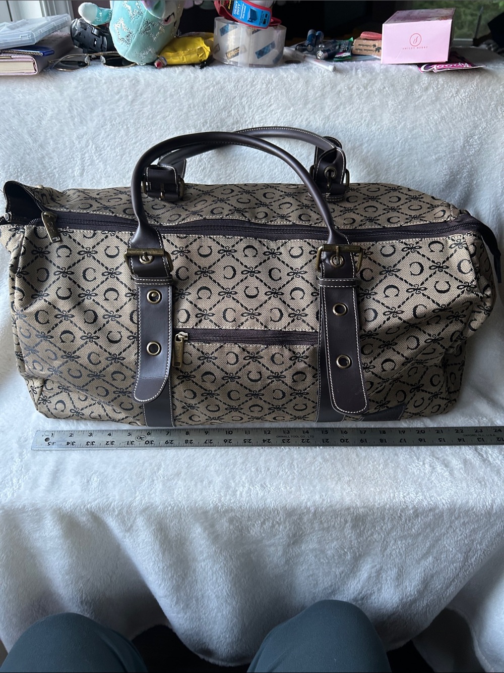 CIAO! 22” duffle bag with faux leather handles buckle